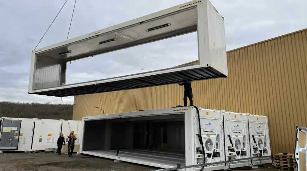 Modular cold storage container installation forming a SuperStore unit